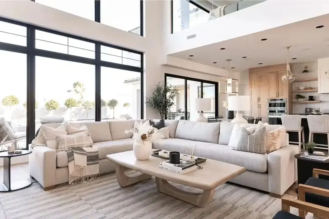 Floor-to-ceiling living room windows with LLumar Neutral solar control window film