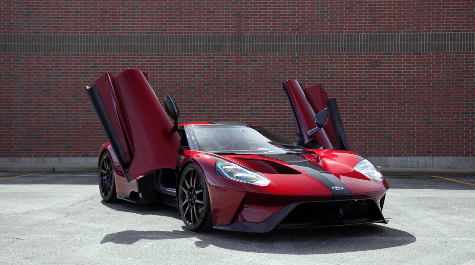 Red Ford GT front three-quarter, doors up — IRX sports-car ceramic look