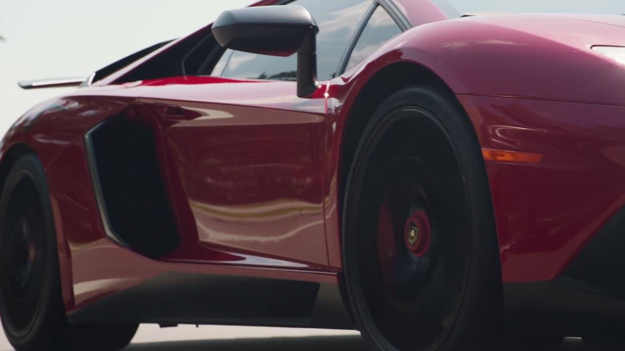 Red sports car with a protected finish — video poster