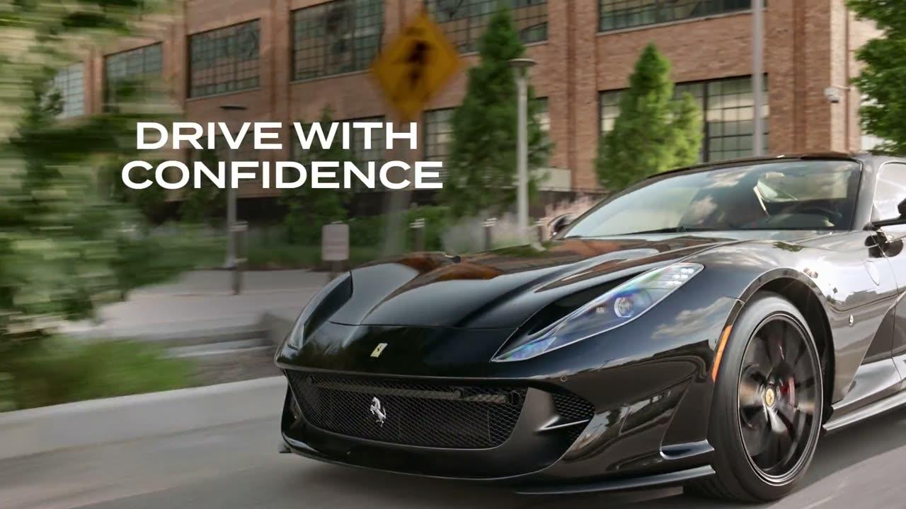 Black sports car on a city street — rule the road video poster